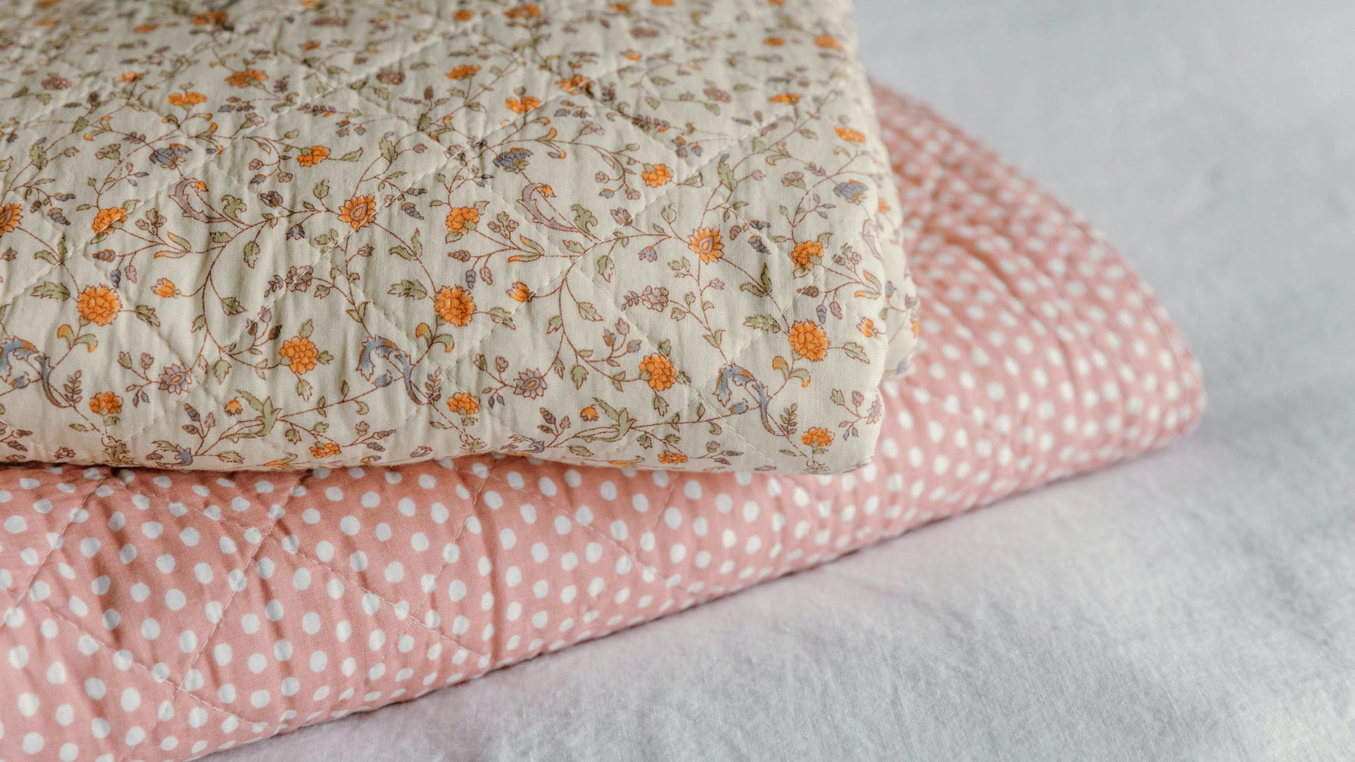 floral and polka dot quilted throws