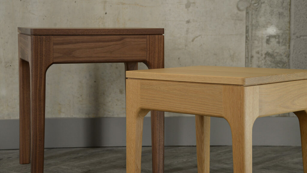 tall camden table in walnut wood shown with original camden table in oak