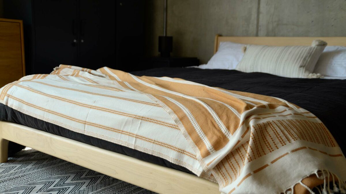 reversible tan and ivory colour woven cotton throw