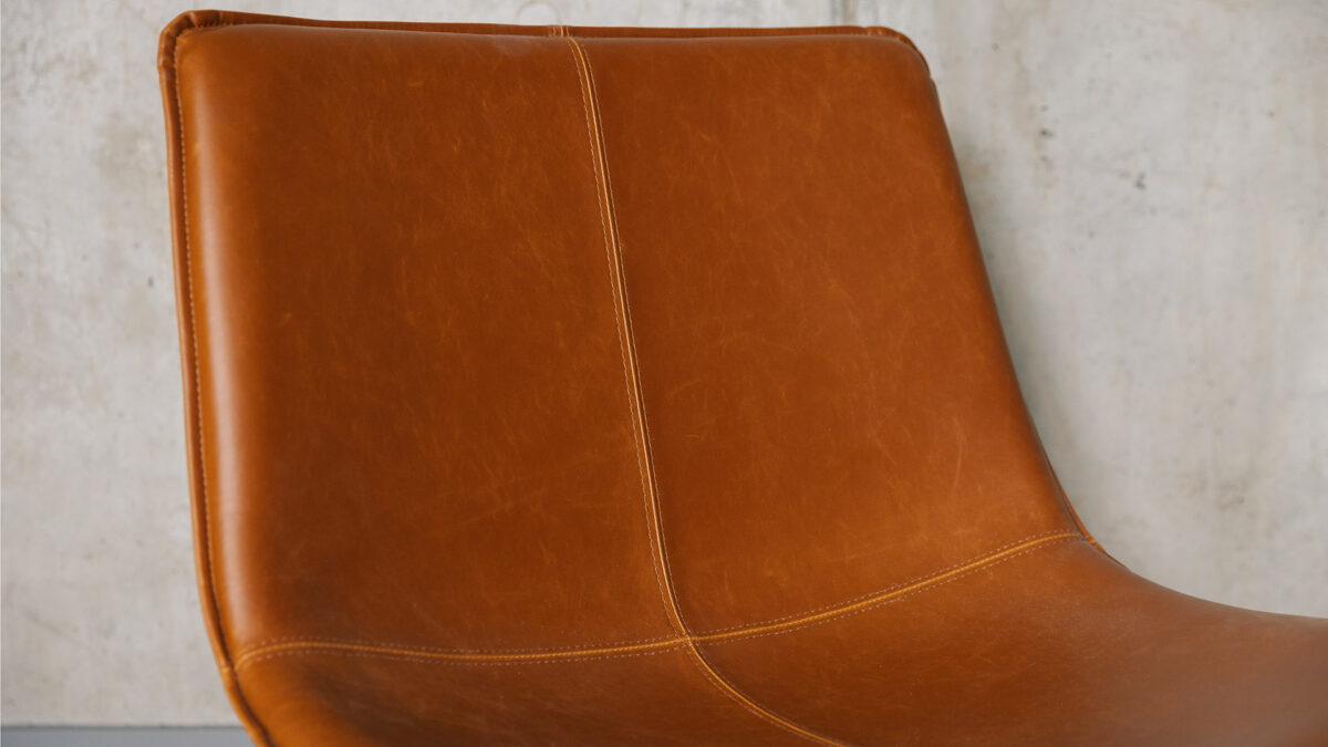 tan faux leather chair detail