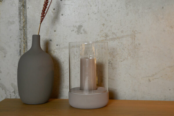 candle holder with a taupe concrete base