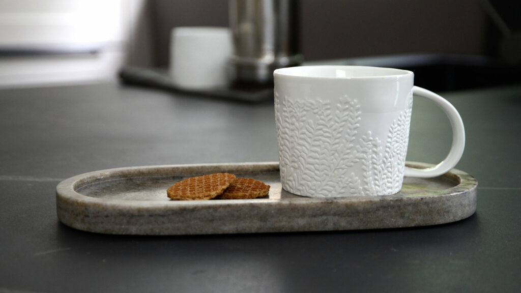 taupe marble serving tray with mug