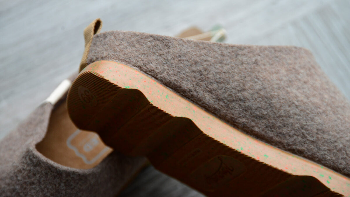 brown felt look slippers with chunky speckled soles sustainably made from recycled bottles