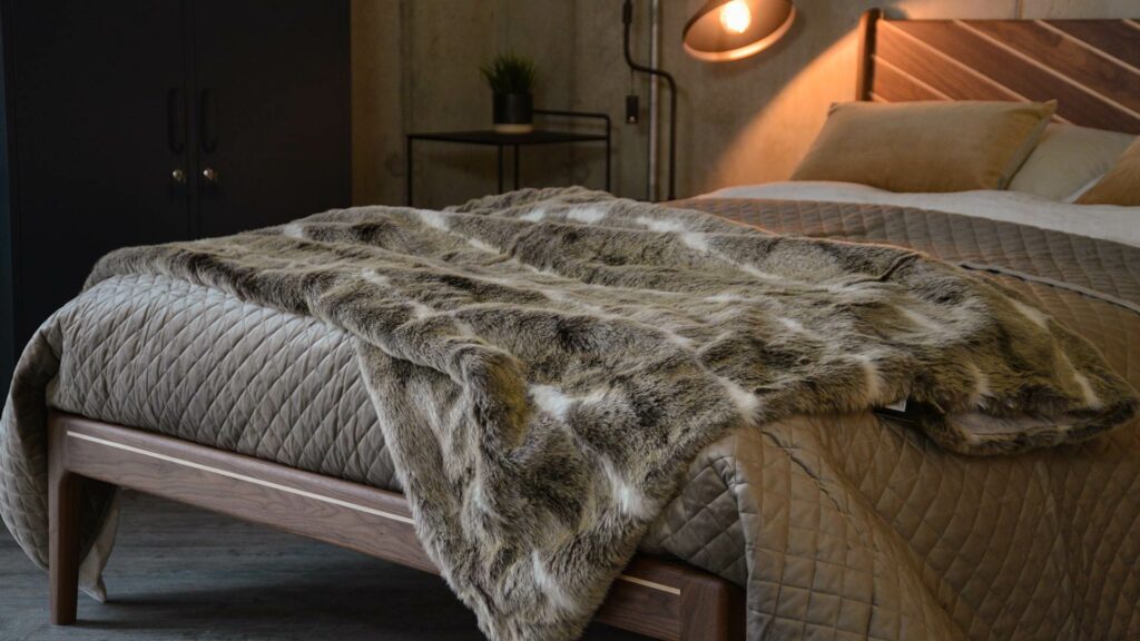 Taupe velvet look quilted and reversible bedspread on our Special edition walnut Hoxton bed