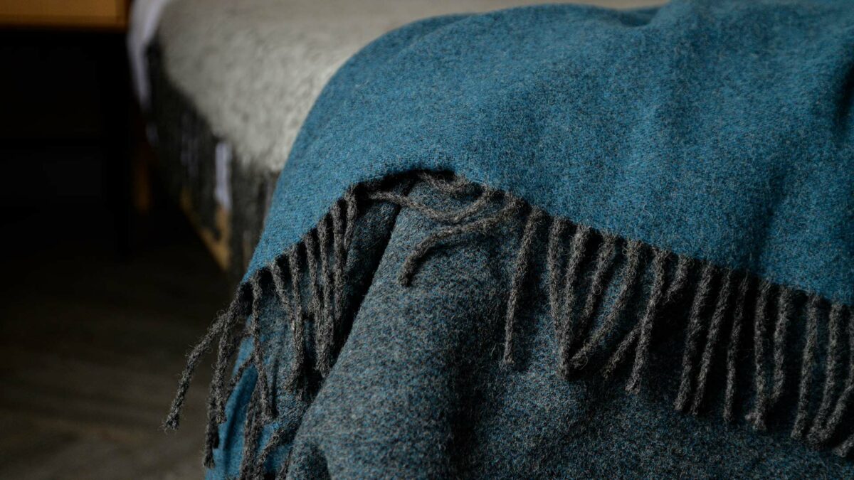 teal and charcoal throw fringe