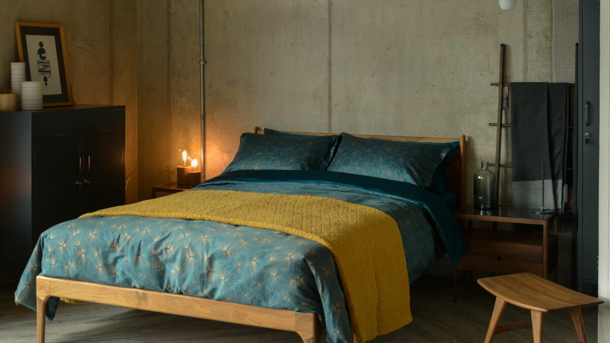 teal gold hexagon print duevt set with ochre bedspread