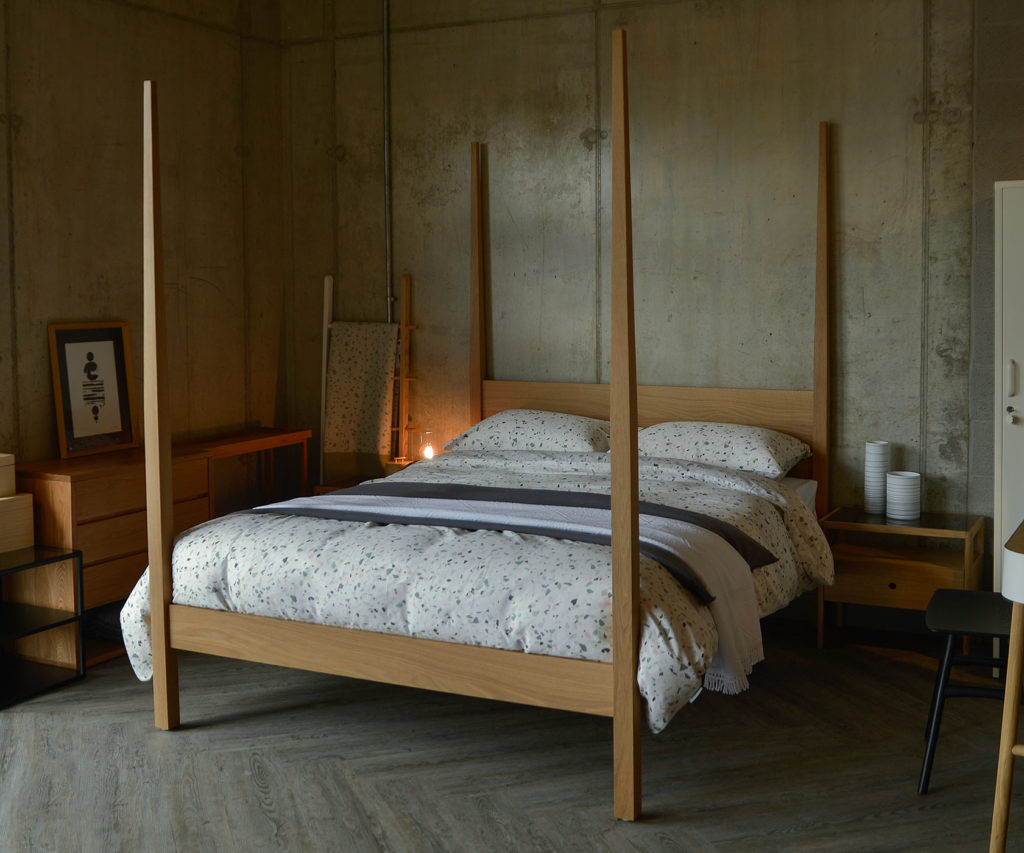 Hatfield is a solid wood hand-made wooden bed with 4 tall tapering posts