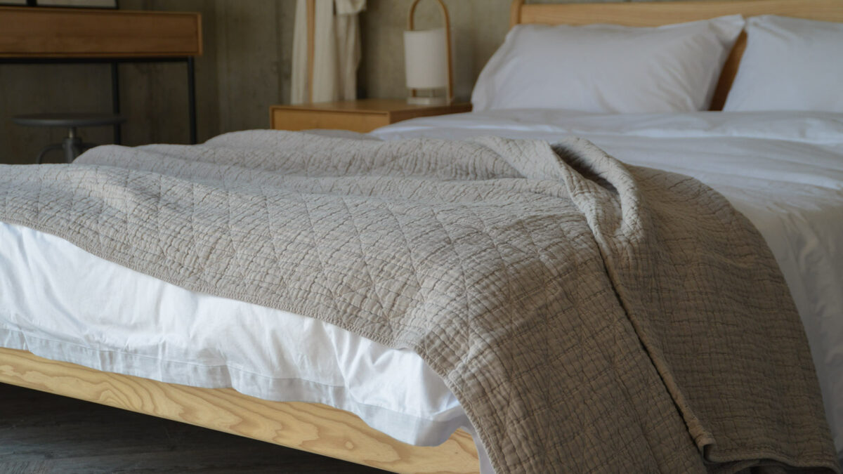 modern warm grey bedspread