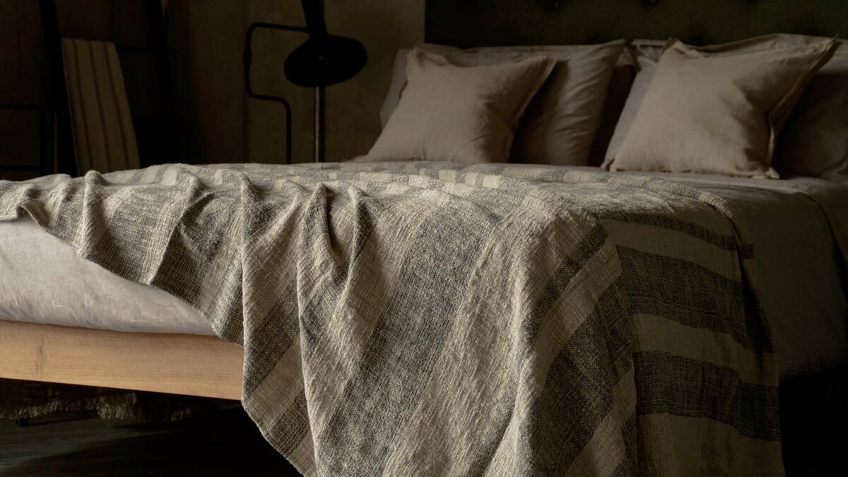 textured cotton throw in taupe with dark grey stripes