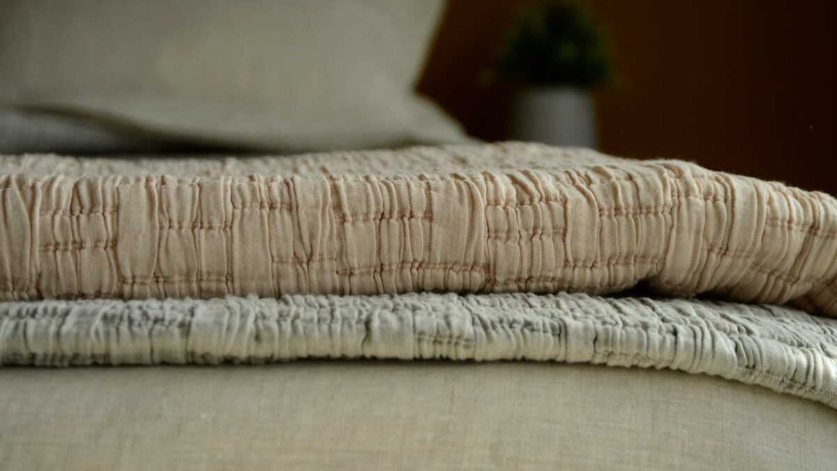 textured quilt detail blush or warm grey