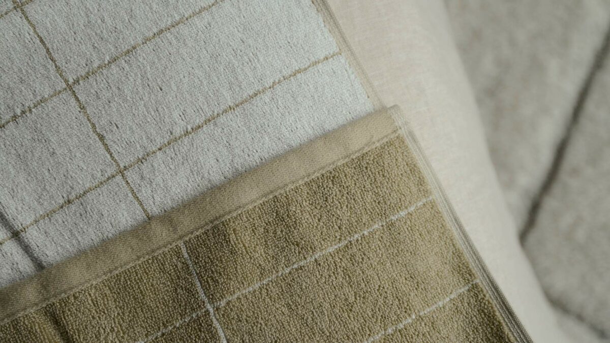 beige and white grid pattern towel