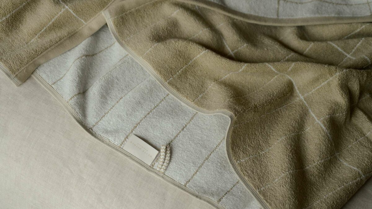 tile pattern beige and white towel