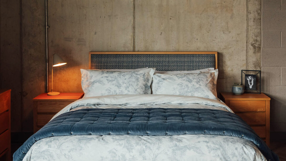 Blue bedroom with Kingsize Shetland Wooden bed in Oak with padded headboard