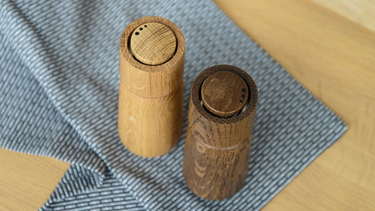 wooden salt and pepper grinders shown from above