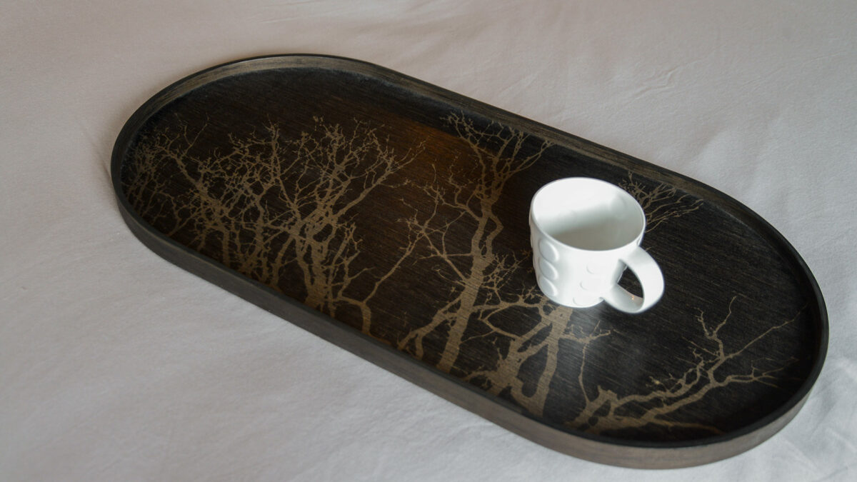 Ethnicraft lozenge shape tray in dark wood with trees pattern