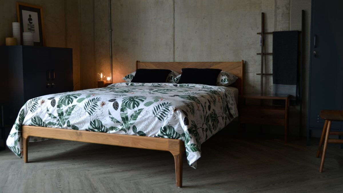 Solid wooden Hoxton bed in walnut wood, hand made by us in Sheffield UK.