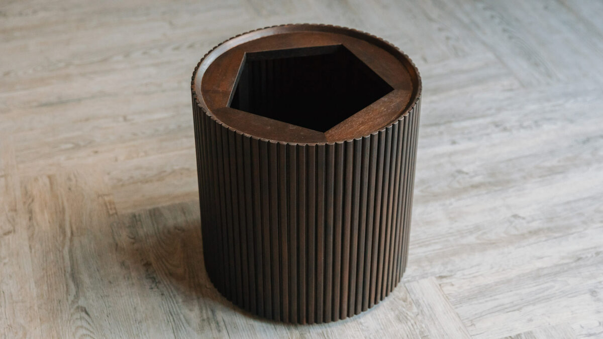 Storage stool or side table in dark mahogany shown without lid