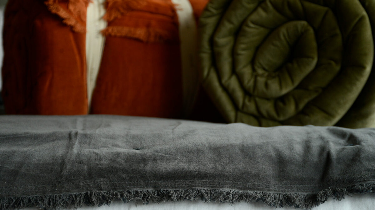 velvet reversible quilts in grey burnt orange and khaki