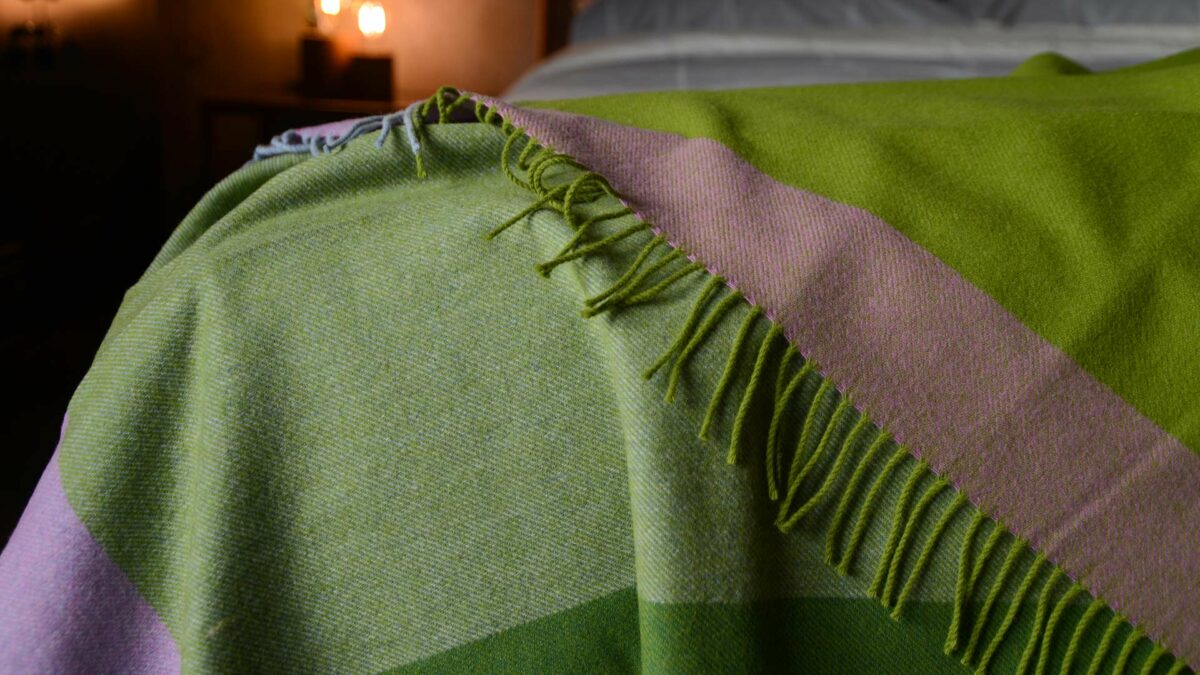 green and blue colour block throw