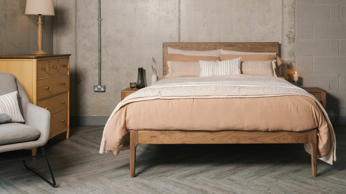walnut Chiswick bed with pink clay colour bedding