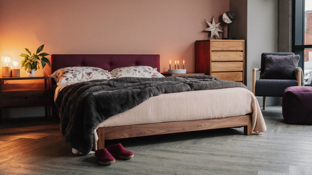 Walnut bed frame - our hand made Iona bed with upholstery in Amatheon Emperor wool fabric