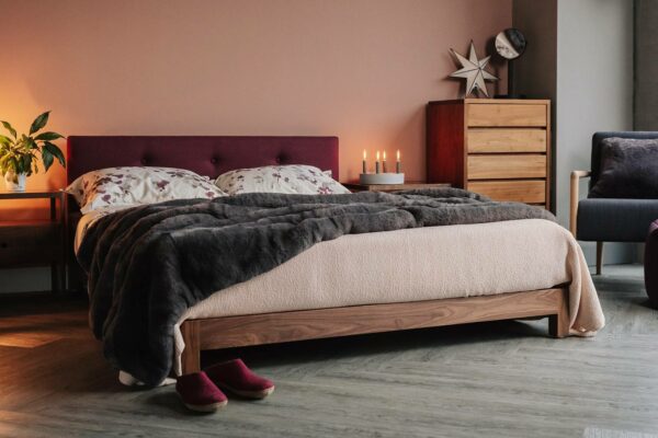 Walnut bed frame - our hand made Iona bed with upholstery in Amatheon Emperor wool fabric