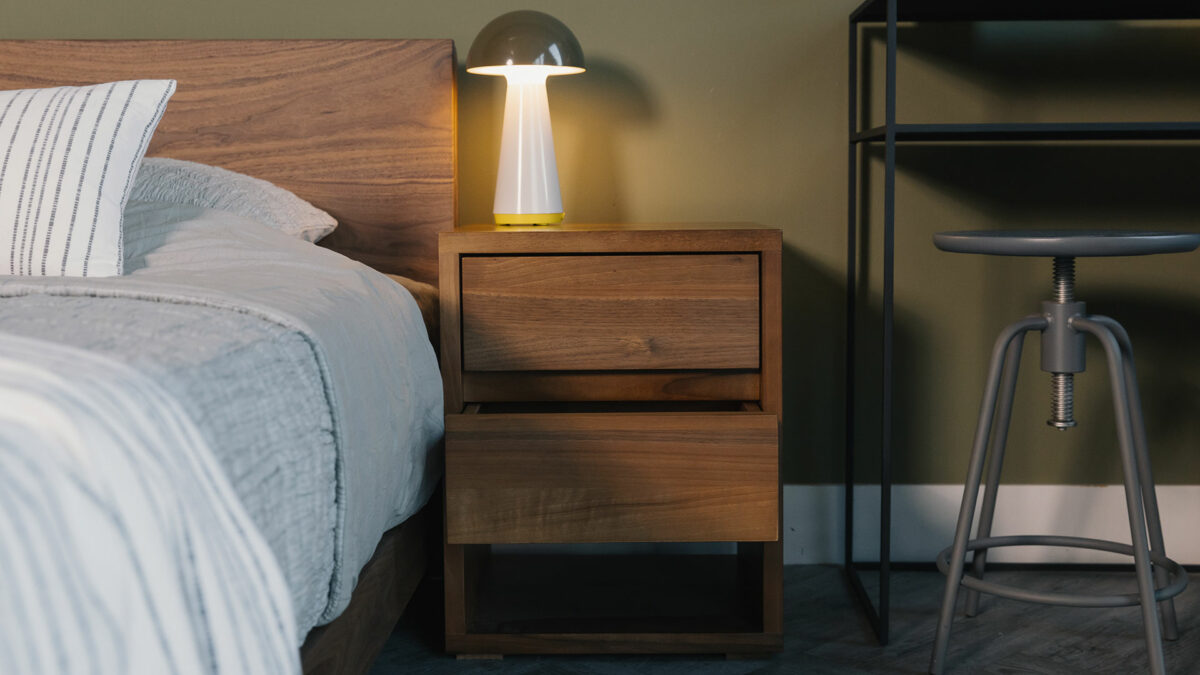 solid walnut wood two drawer bedside table with open shelf at the bottom