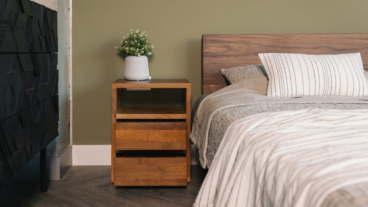 solid walnut wood two drawer bedside table with open shelf at the top shown with drawers open