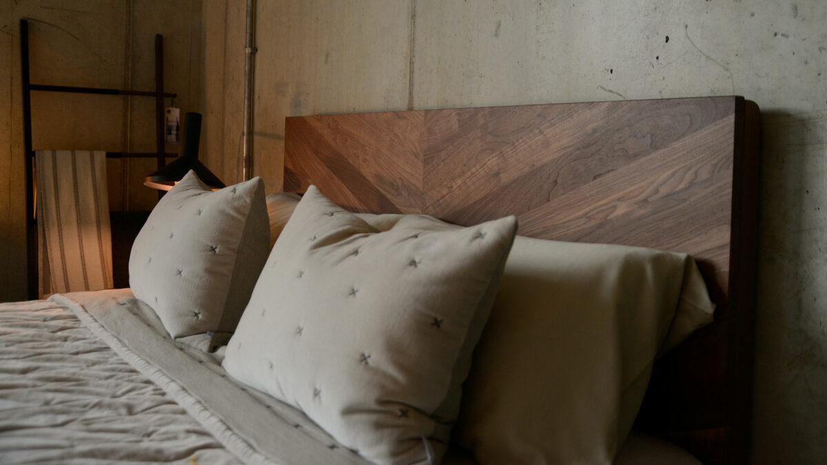 Hathersage bed with chevron headboard in solid walnut