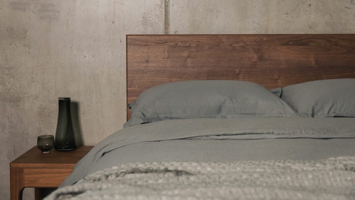 walnut chiswick bed with grey muslin bedding