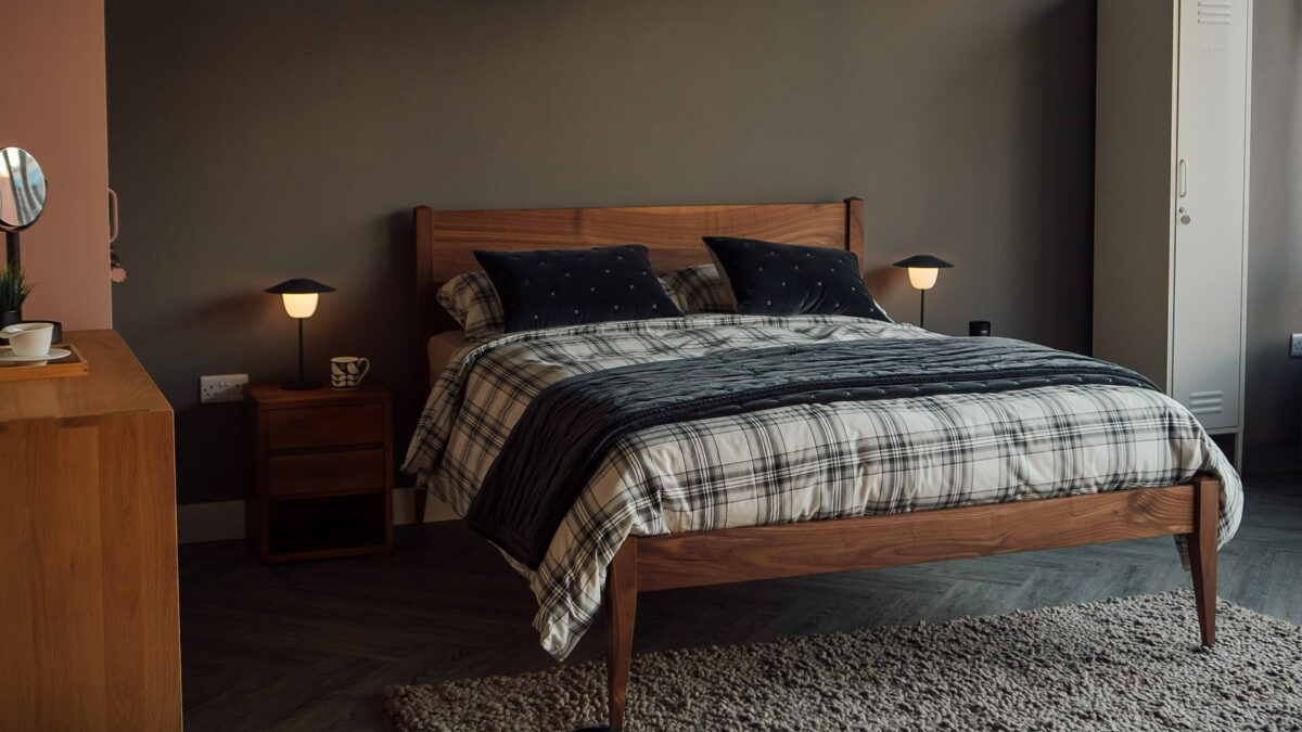 walnut cochin bed with brushed cotton plaid bedding