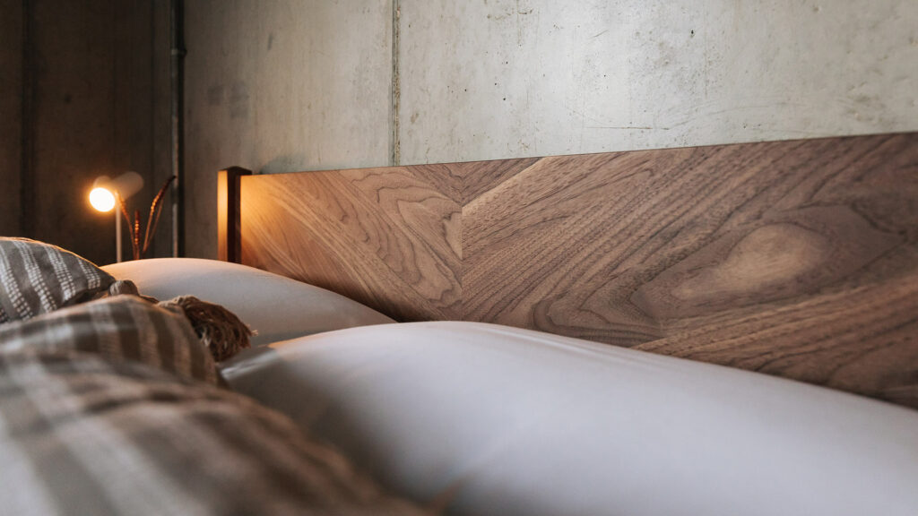 a close up view of the Walnut Dalston bed headboard