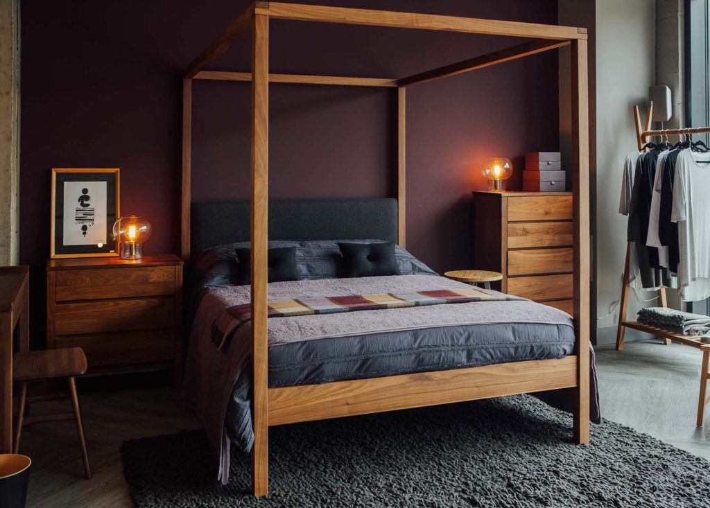 Cosy Winter bedroom featuring the solid wood Highland 4 poster bed in Walnut and walnut shaker drawers