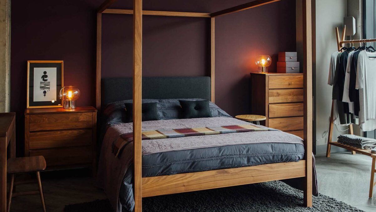 Cosy Winter bedroom featuring the solid wood Highland 4 poster bed in Walnut and walnut shaker drawers