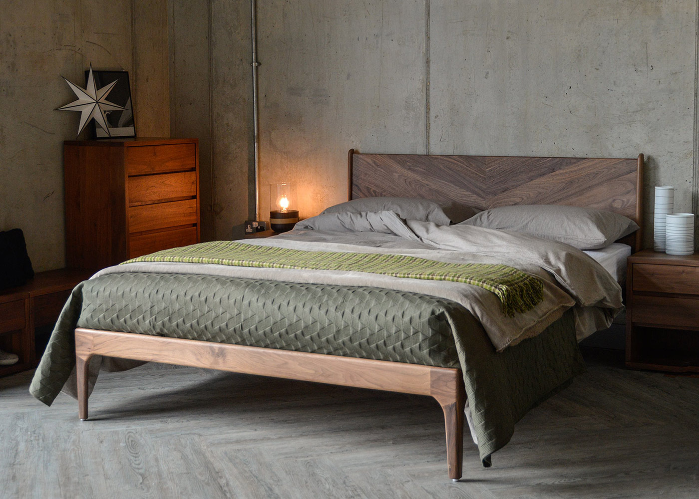 Mid-century style hand made Hoxton bed with its Chevron headboard shown in rich Walnut wood.