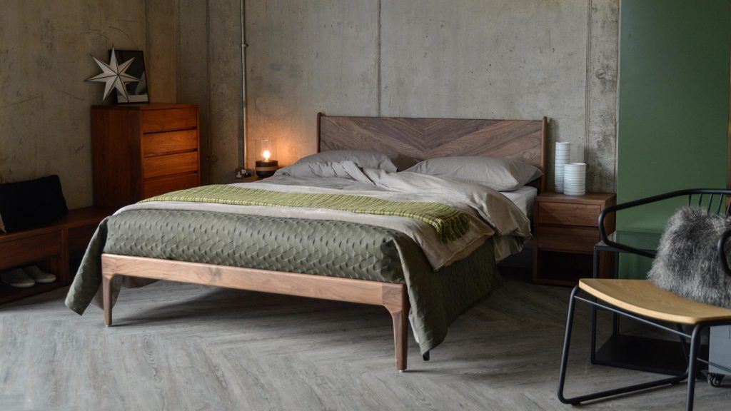 Hoxton contemporary wooden bed with striking chevron headboard and made in Walnut.