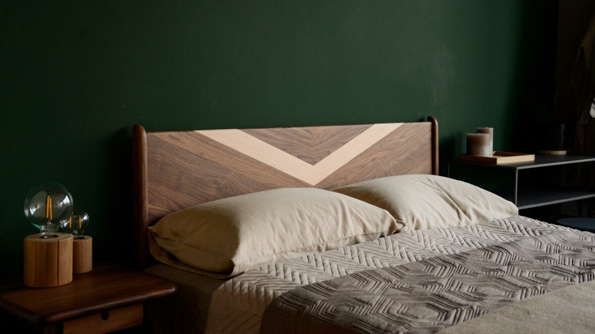 Boldly different a Walnut Hoxton bed with chevron detail in Maple wood