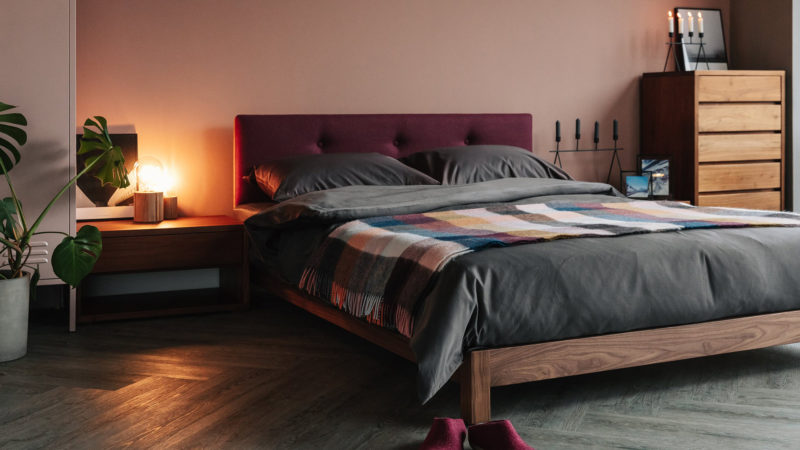 Cosy autumnal bedroom setting for the upholstered wooden low Iona bed