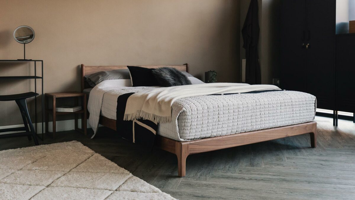 walnut low bed Pimlico with open frame side tables