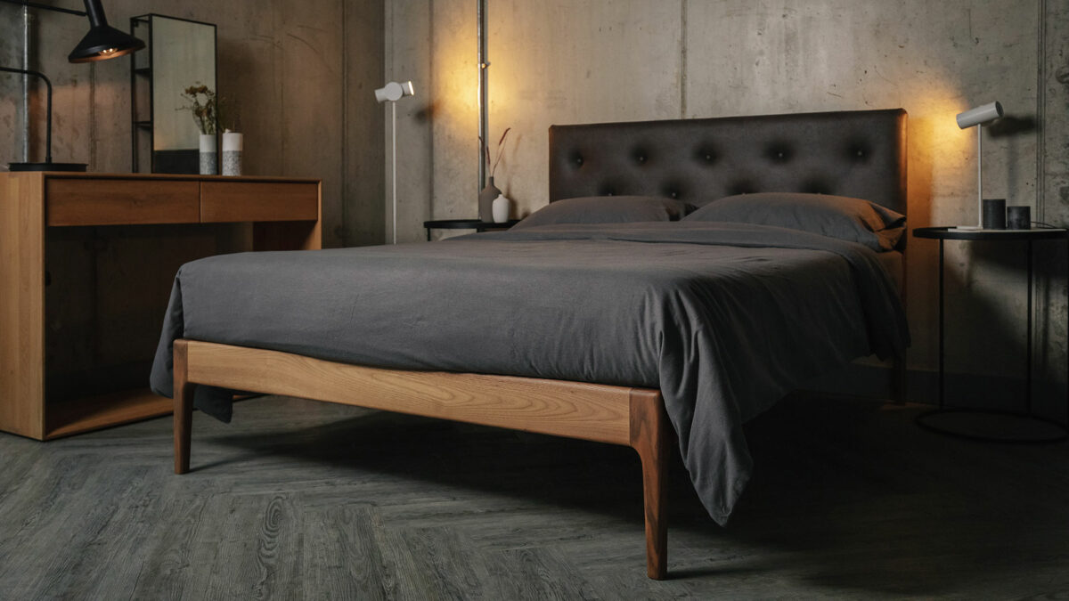 walnut mid century look bed with buttoned faux leather headboard