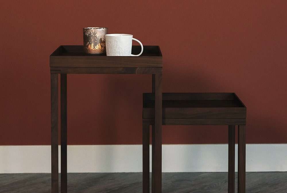 walnut nest of tables with mug and lantern portrait
