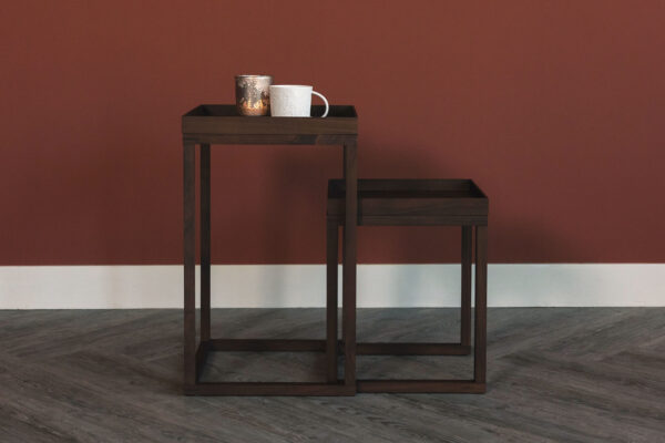 walnut nest of tables with rader mug and candle holder
