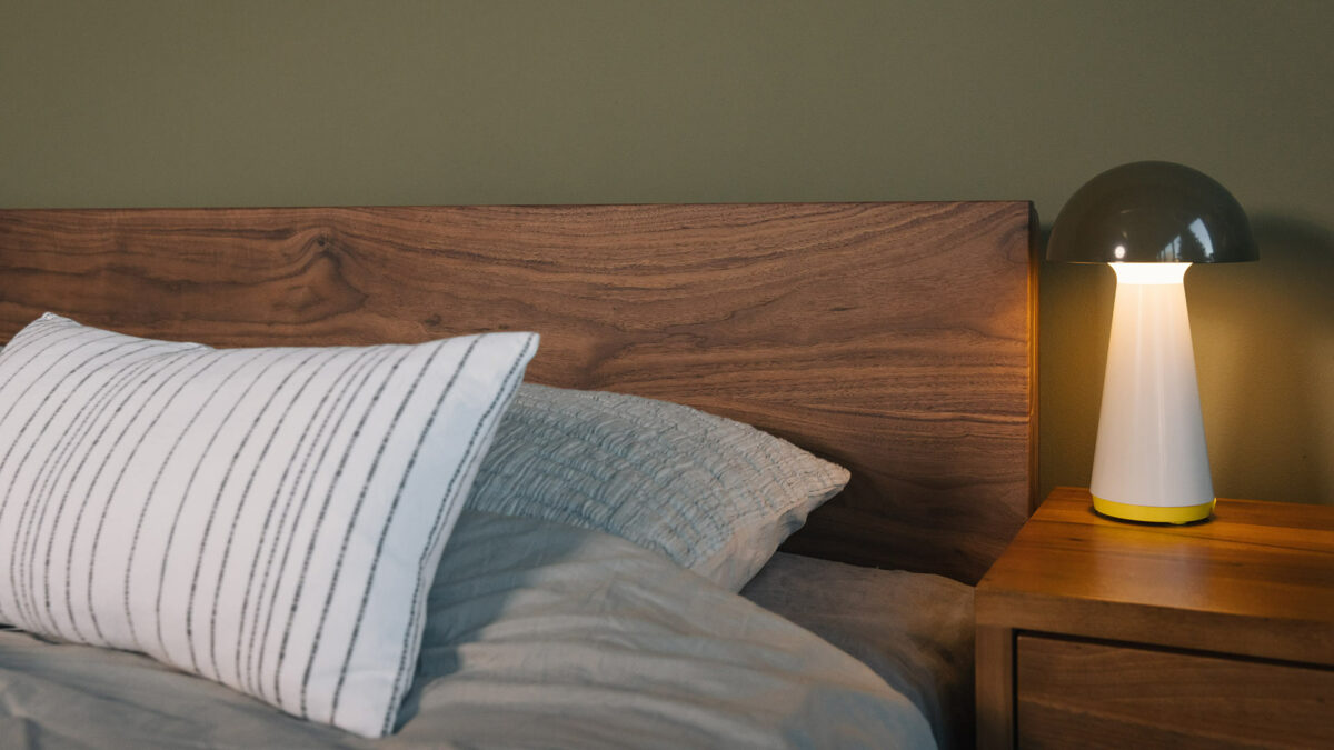 walnut sonora headboard detail with olive mushroom light