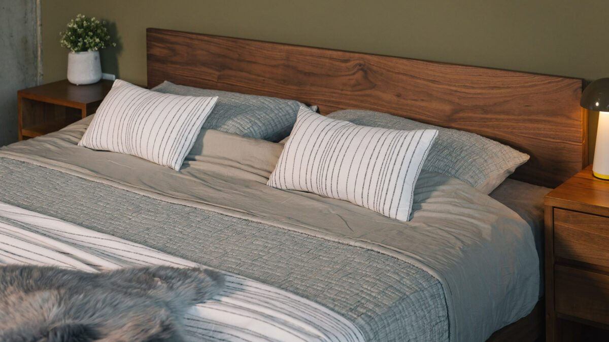 A closer look at the headboard of a Superking walnut wood Sonora bed