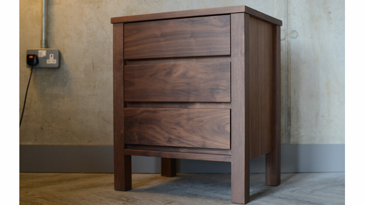 walnut three drawer bedside unit3Q