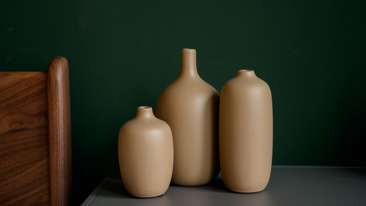 warm beige ceramic bottle vases with a matt finish in a range of sizes