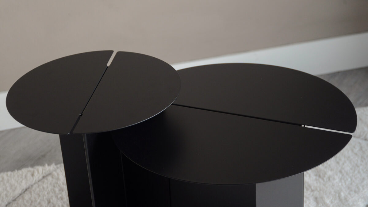 warm black metal side tables detail