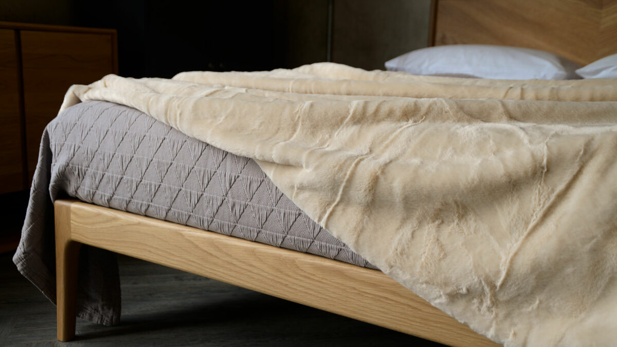 cream coloured soft faux fur throw