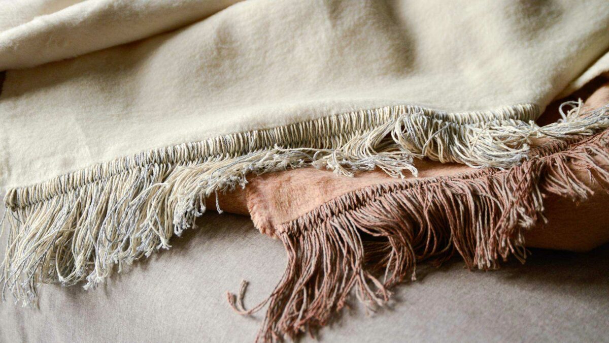 softest cosy brushed cotton blankets with fringe and in two colour options