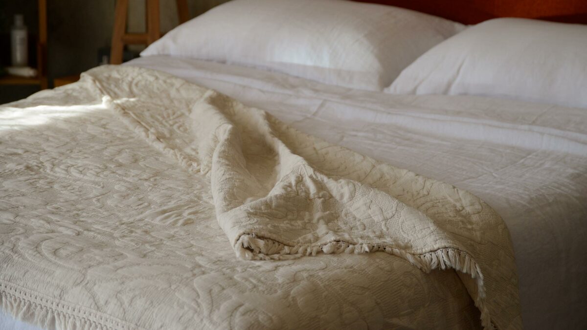 warm light stone colour throw with fringe detail
